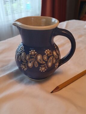 Handcrafted Blue Ceramic Pitcher with White Floral Accents